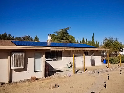 Solar panels installed on a house in the high desert